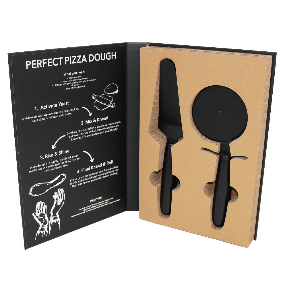 Black pizza peel and cutter set in a cardboard packaging with a recipe card on a white background