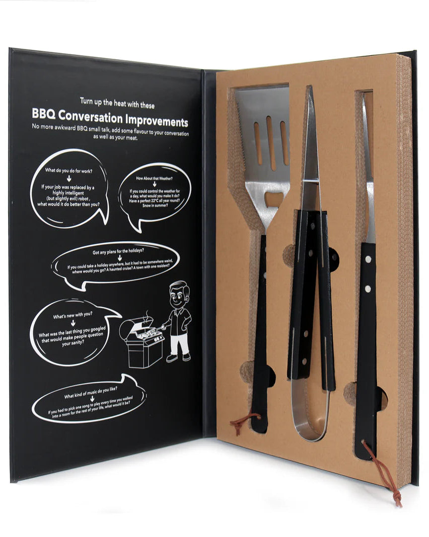 Barbecue utensil set in a book-shaped packaging with text on the left side.