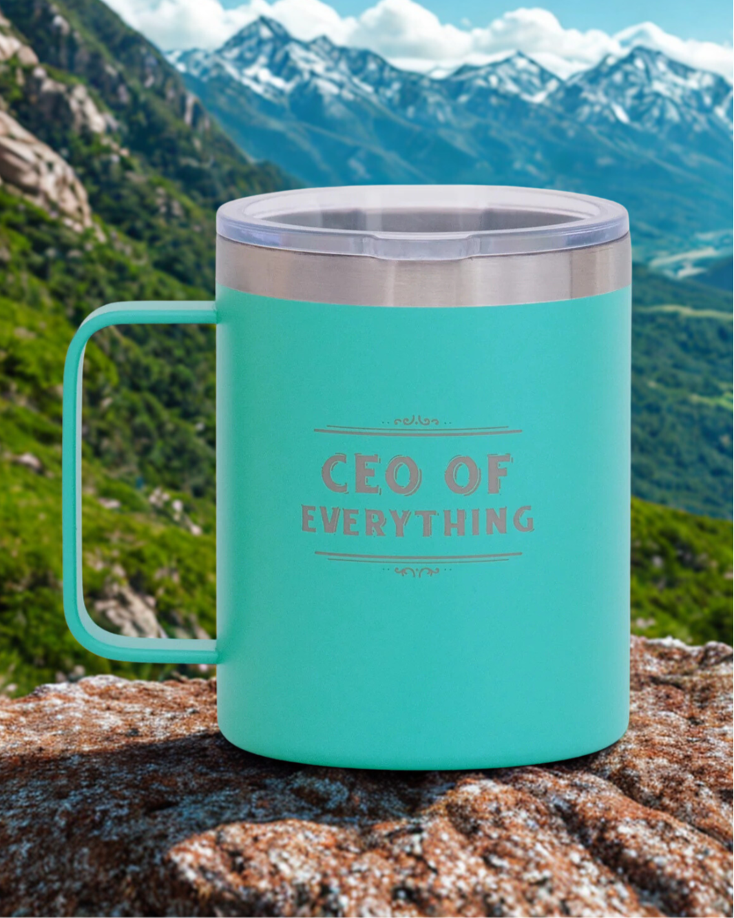 Turquoise mug with 'CEO of Everything' text on a mountain background