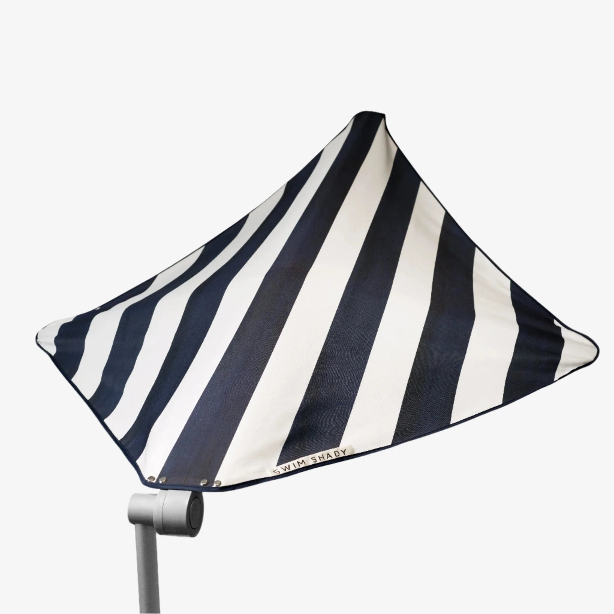 Black and white striped umbrella on a white background