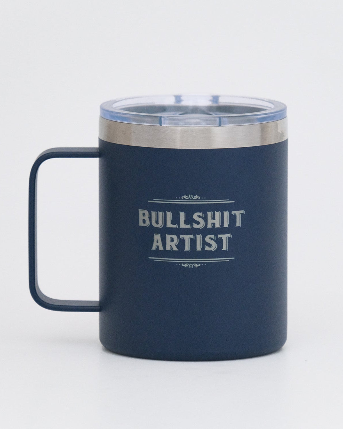 Navy blue mug with 'Bullshit Artist' text on a white background