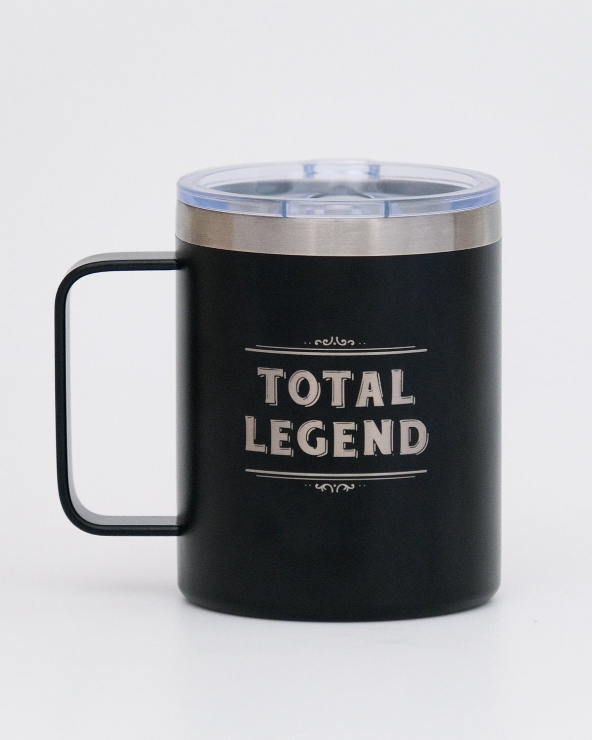 Black mug with 'Total Legend' text on a white background
